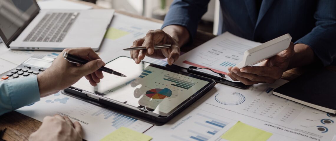 A group of colleagues sitting around a conference table.