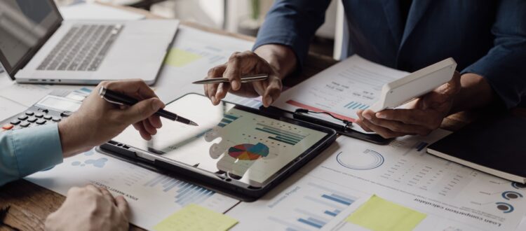 A group of colleagues sitting around a conference table.